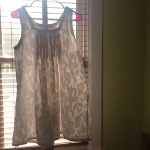 White cotton just above knee length A-Line dress